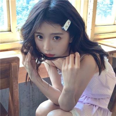 照片的她